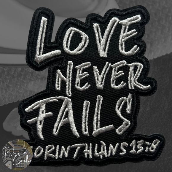 Love Never Fails Iron On Patch - Picture 1 of 3